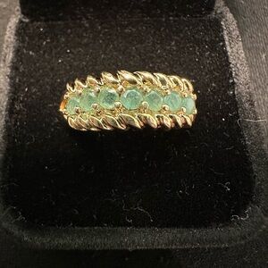 Gold Band Ring with Green Gemstone Row